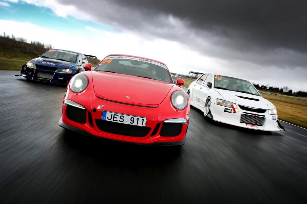 Porsche and two EVO at Drivers Parade before starting FastLap EE Giedrius Matulaitis matulaitis.lt